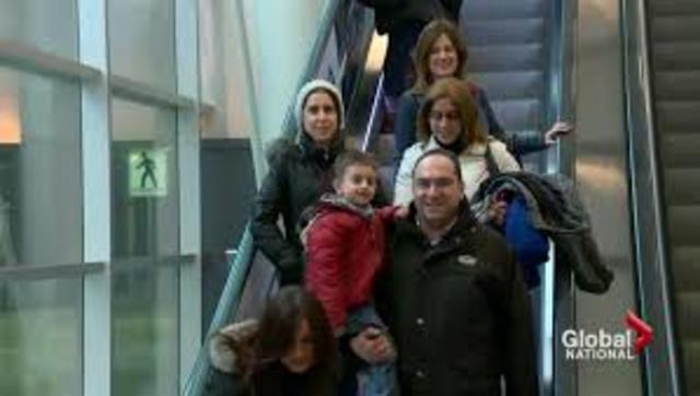 First Planeload of Syrian Refugees