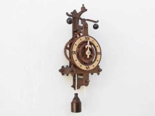 Reloj mecánico de pesas