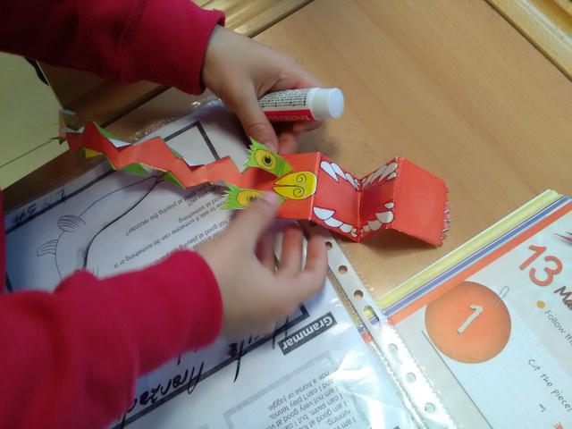 Stick the pieces of dragon