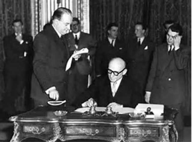 Treaty of Paris creates European Coal and Steel Common Market (ECSC)