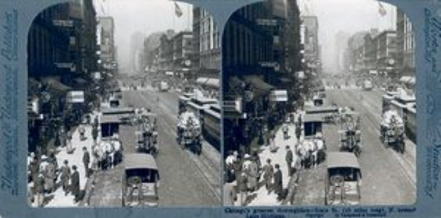 Pedestrians, street cars, and horse-drawn carts and carriages