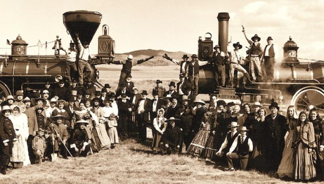 Transcontinental Railroad celebrates completion on May 10, 1869 near Promontory, Utah.