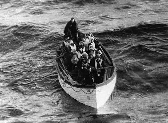 The lifeboats began being loaded with women and children first.
