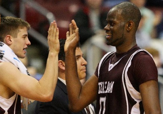 Davis sparks Aggies past BYU, 79-66