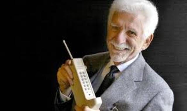 Martin Cooper develops the first handheld cellphone (mobile phone).