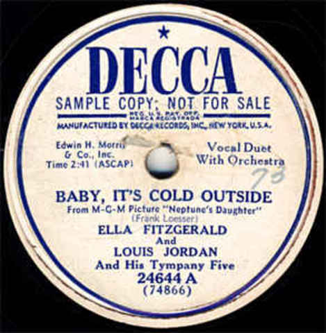 Records "Baby It's Cold Outside" with Ella