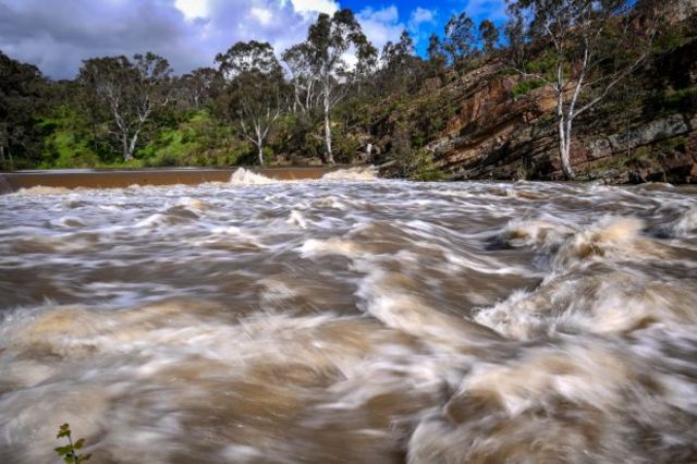 Further breach of weir after heavy rainfall