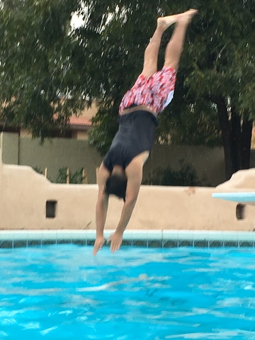 Diving into a pool