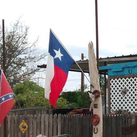 Texas Pride  (My father flies several of the flags of Texas, the American flag and the Confederate flag at the lake place)