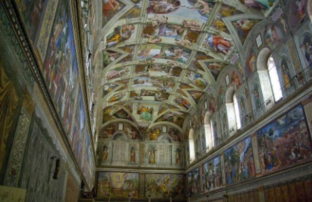 Michelangelo begins painting Sistine Chapel