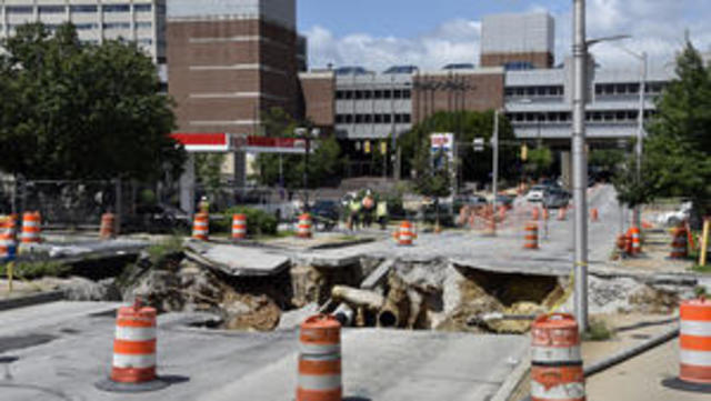 Sinkhole opens on Mulberry Street between Paca and Green Street in Baltimore, MD