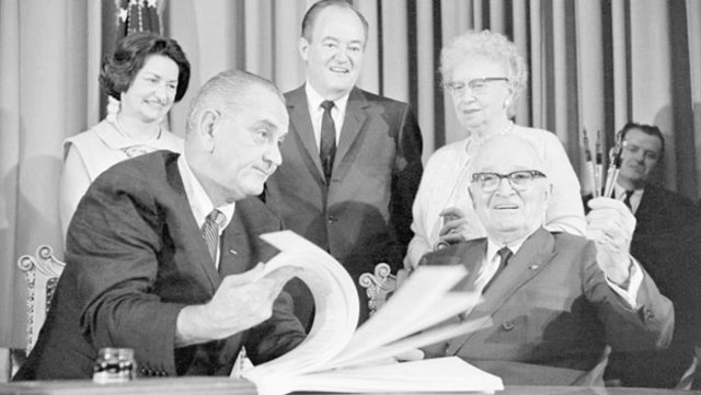 Johnson Signs Medicare into Law