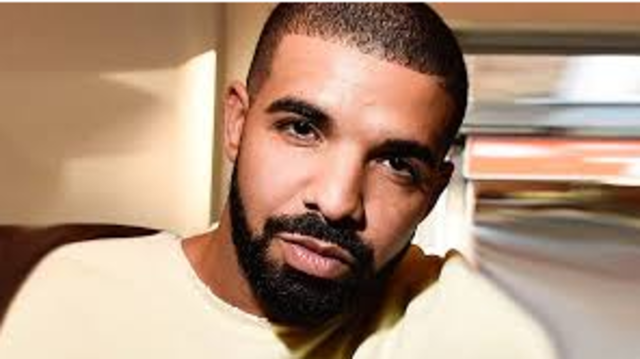 Drake releases his second album Take Care