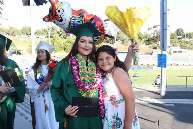 My sister's high school graduation and my elementary promotion on the same day