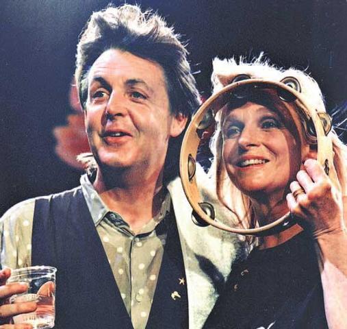 McCartney and his wife socializing at an event