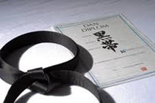 He pass the exam of 1 dan in karate