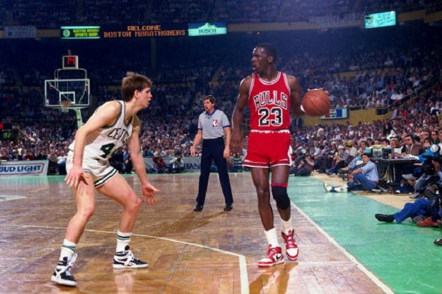 Michael Jordan scores a playoff high 63 points in a loss to the Celtics.