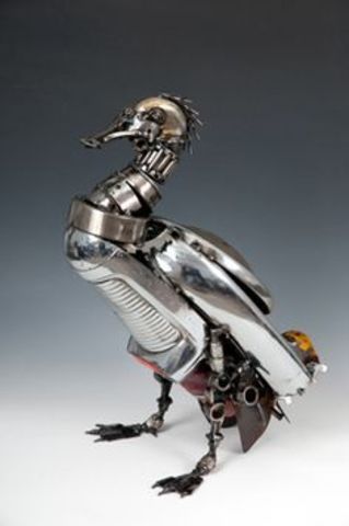 pato mecánico capaz de comer y agitar sus alas