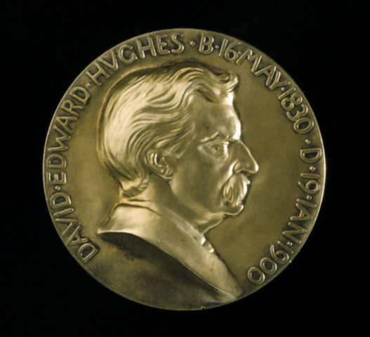 Receives "Hughes Medal" from Royal Society of London