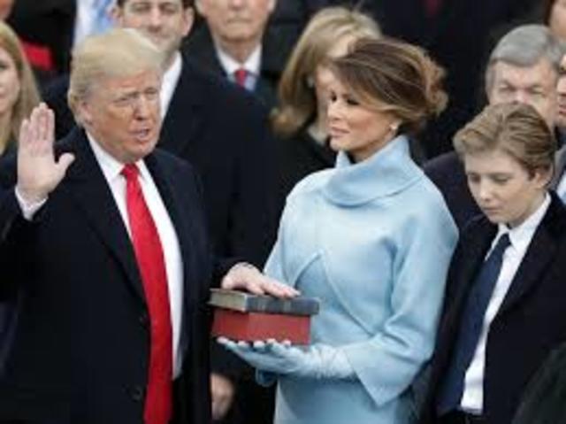 Sworn in. His presidency starts