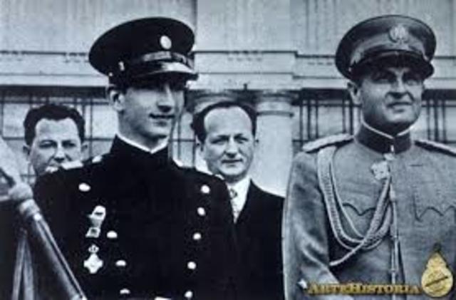 El Rey Pedro II de Yugoslavia da un Golpe de Estado contra el gobierno nazi, en Belgrado, y entonces Hitler decide la invasión de los Balcanes.