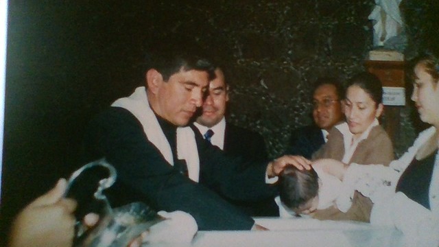 Mi bautizó.