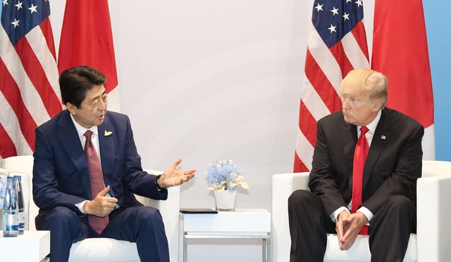 Japan’s Abe heads to Washington this week bearing pledges of jobs and investment