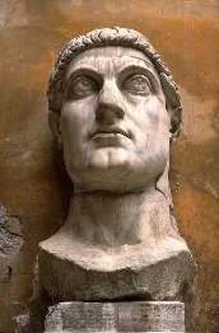 Constantine converts to Christianity