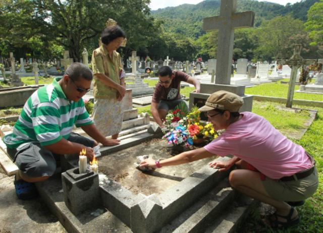 Families start cleaning and decorating graves