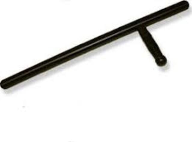 Invents Side-Handle Baton