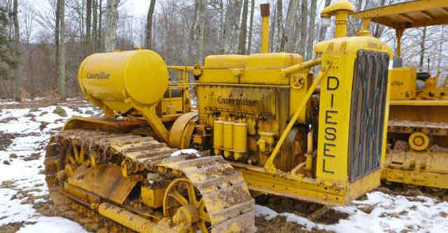 Cat or caterpillar started to use diesel engines in their tractors