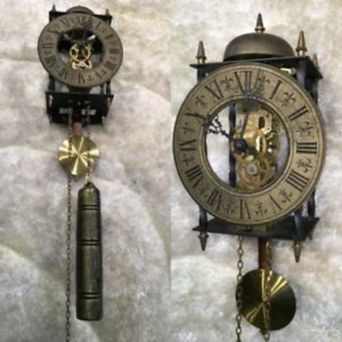 MECHANICAL CLOCK WITH WEIGHTS