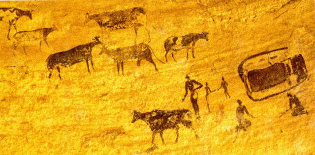 Grotschildering van veeteelt bij ronde hutten Zuid- Algerije