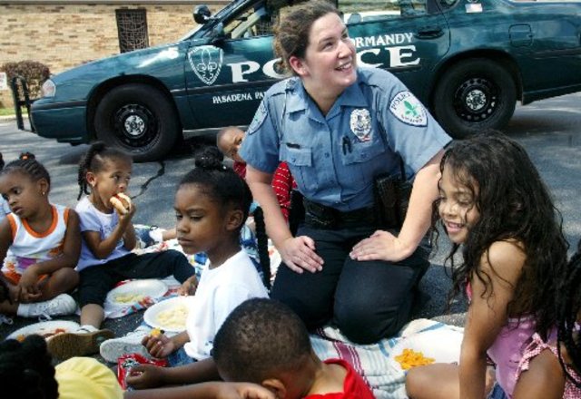 police officers help out the community