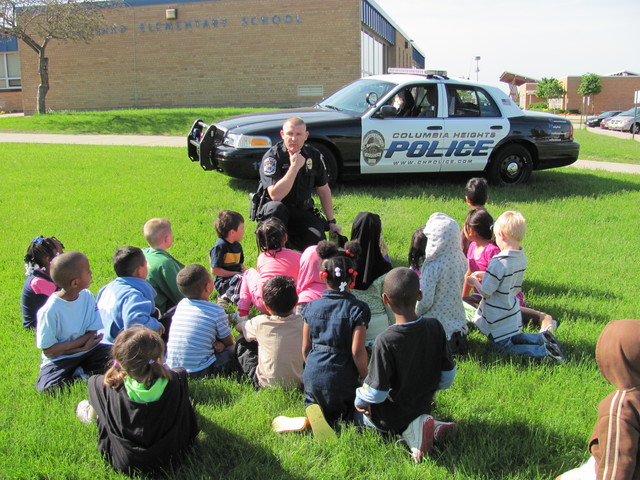 police officers help out the community