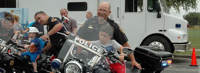 police officers help out the community