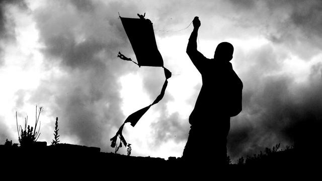 Amir and Sohrab fly the kite together