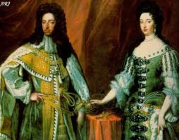 William and Mary become the King and Queen of England (Glorious Revolution).