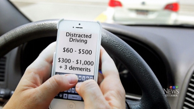 Quebec implements distracted driving charges.