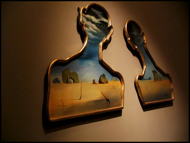 "Couple avec leurs tüetes pleines de nuages" Salvador Dali