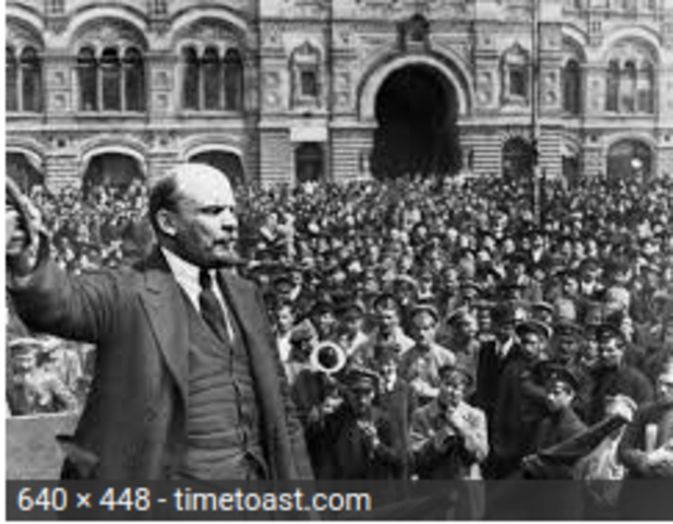 Lenin returns from exile and arrives in Petrograd via a sealed train