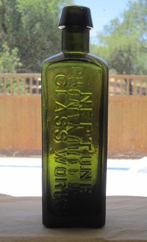 the green medicine bottle