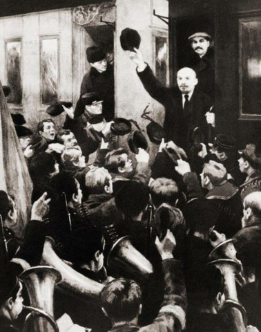 Lenin returns from exile and arrives in Petrograd via a sealed train