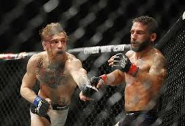 defeats chad mendes to become the interim featherweight title holder