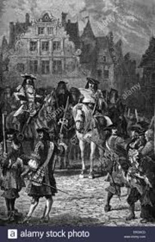 Louis XIV revokes Edict of Nantes