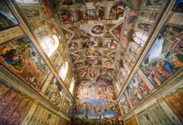 Michelangelo begins painting the Sistine Chapel