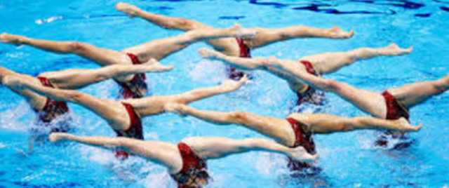 Circa 1924: Rock lifting, club swinging, and swimming were skills that were discarded