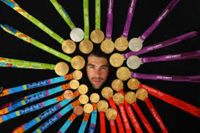 Michael Phelps the Olympian retires with 23 gold medals and a world record.