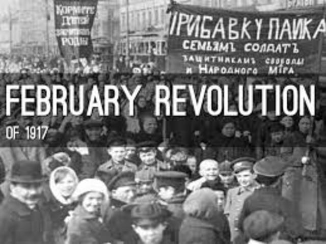 The February Revolution begins with strikes, demonstrations, and mutinies in Petrograd