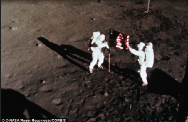 Neil Armstrong/Buzz Aldrin walk on the moon